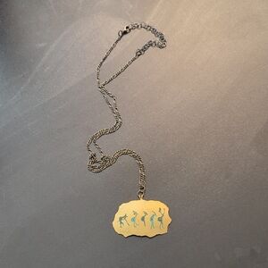 Vintage 90s Gold Over Copper Prehistoric Art Pendant